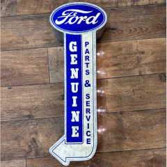 Sign Ford Genuine Parts off the Wall